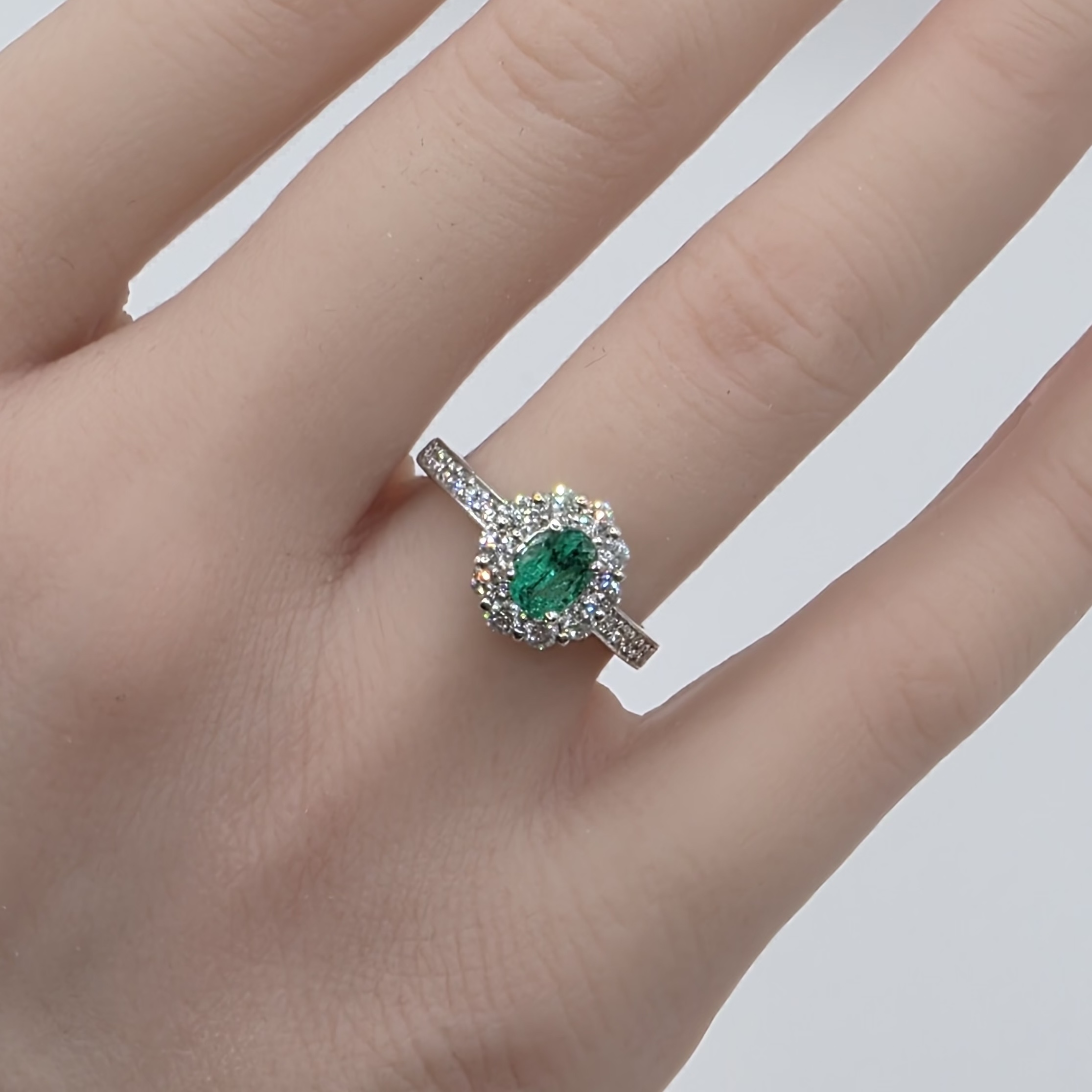 Emerald & Diamond Halo Ring in PT900 – Size 12