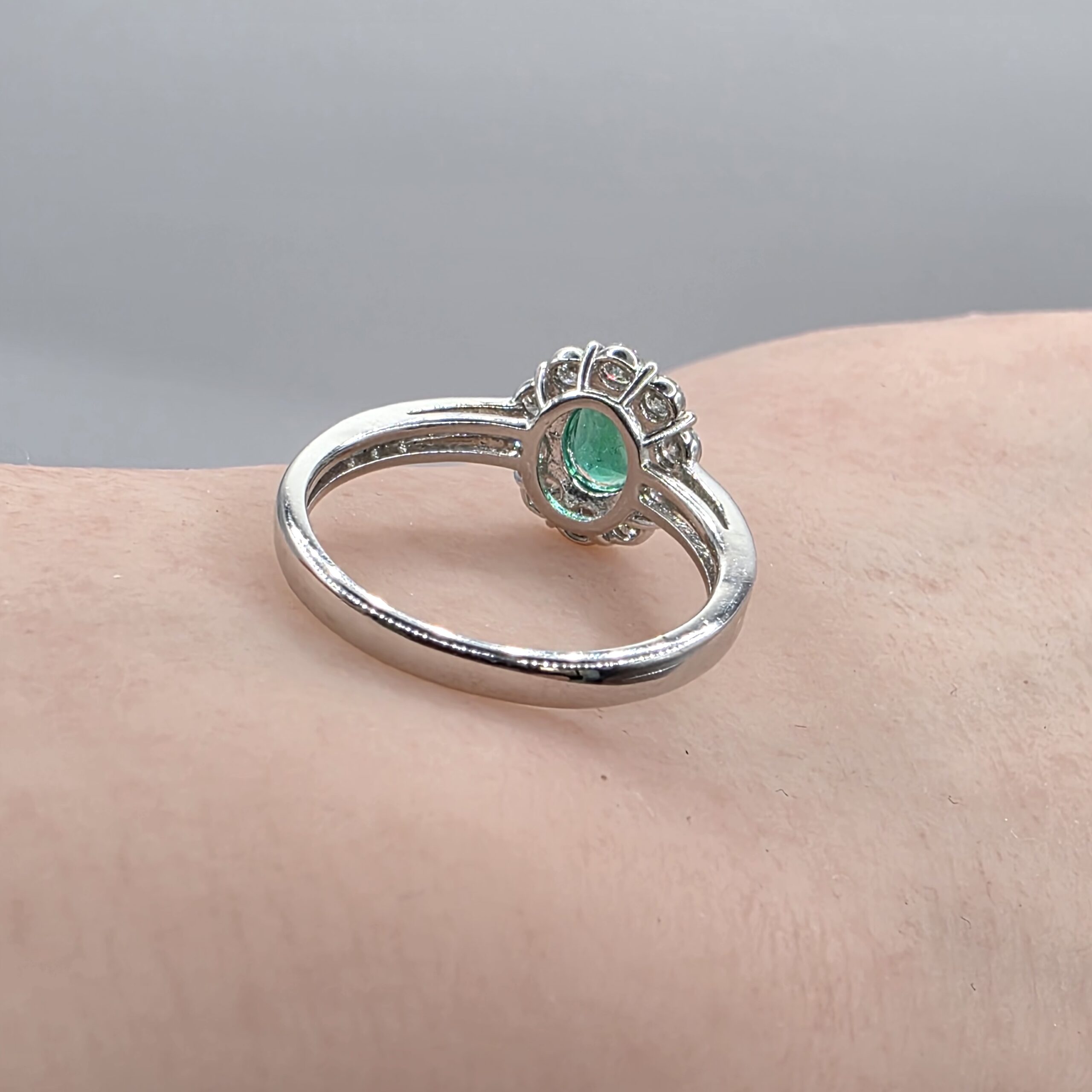 Emerald & Diamond Halo Ring in PT900 – Size 12